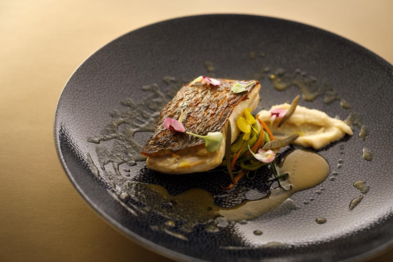 Boutique & Design Hotel Navis - Small Luxury Hotels Of The World Opatija Bagian luar foto A dish prepared by the restaurant
